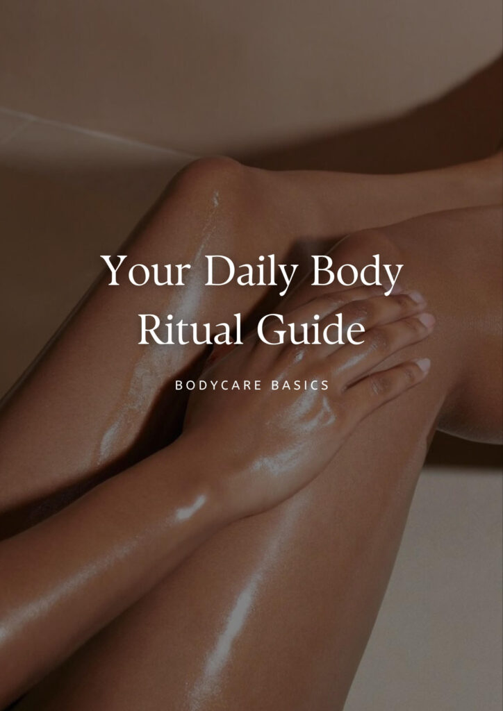 Body care products and textures arranged in a soft, minimal aesthetic.