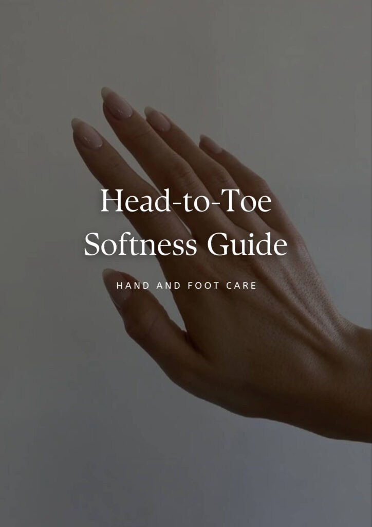 Close-up of soft hands and feet with skincare products in a calm, minimal setting.