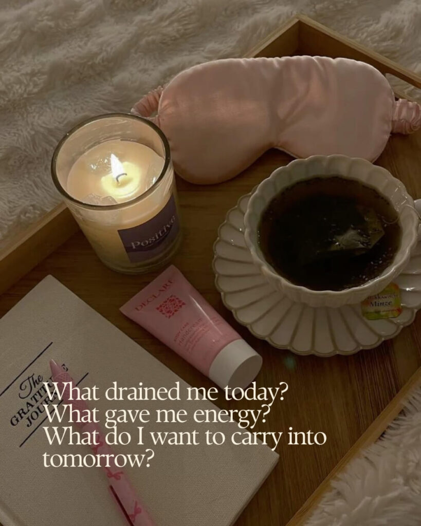 Close-up of a hand writing in a journal by candlelight, with warm shadows and a soft, intimate atmosphere.