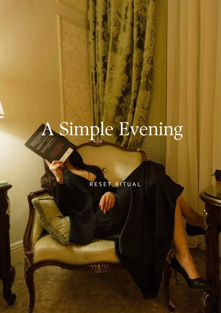 A moody evening scene with a lit candle, an open journal, and soft warm lighting, creating a calm night routine atmosphere.