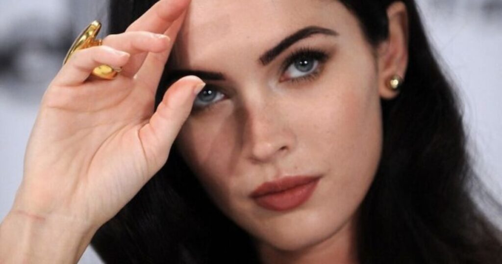 Dark feminine woman with intense gaze — self-possessed and magnetic