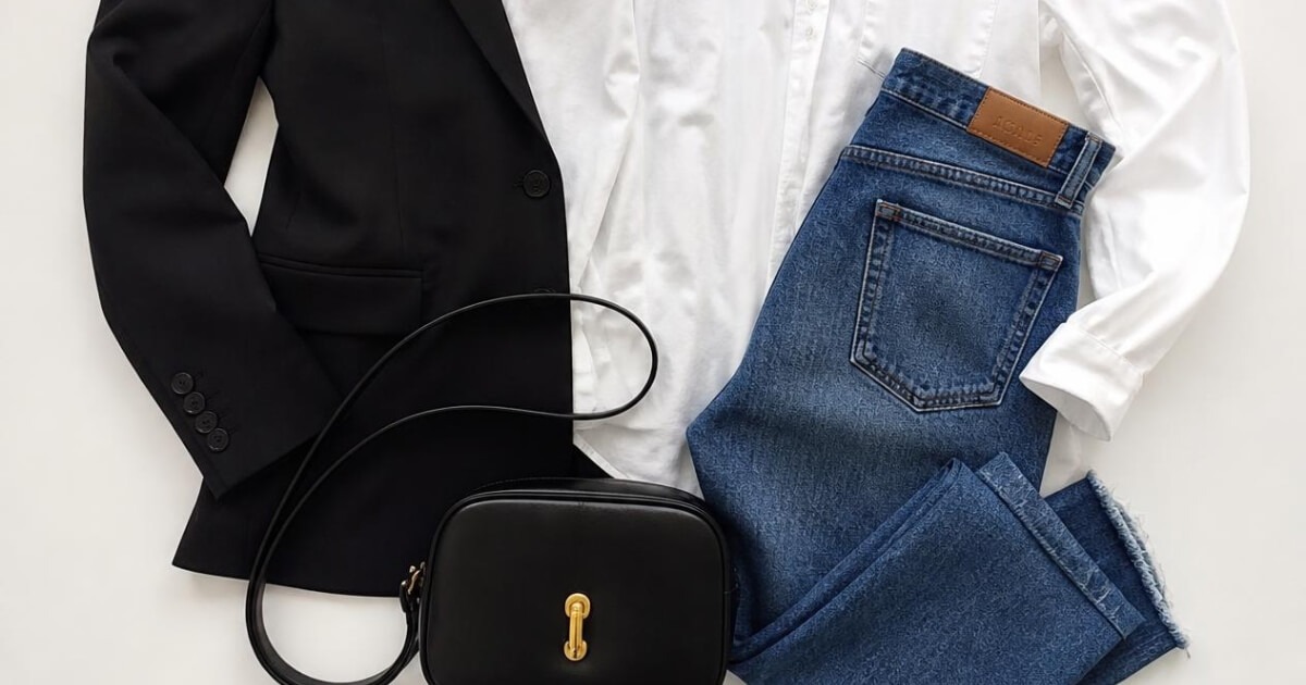 Carolyn Bessette capsule wardrobe essentials flatlay with white shirt and black blazer
