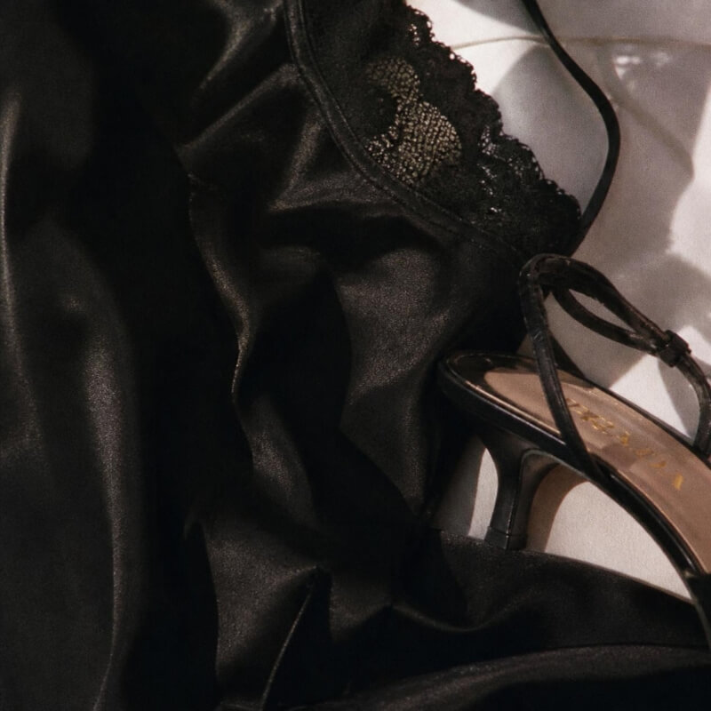 Carolyn Bessette style black slip dress detail