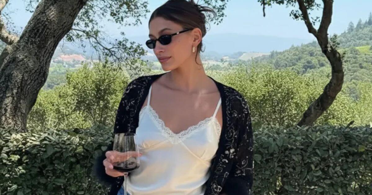 Hailey Bieber street style formula, neutral outfit with one focal accessory